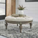 Liberty Furniture Americana Farmhouse Round Cocktail Ottoman in Dusty Taupe